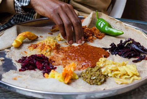 ¡Journey Through Ethiopian Cuisine: A Culinary Tapestry Woven With Flavor and Tradition!